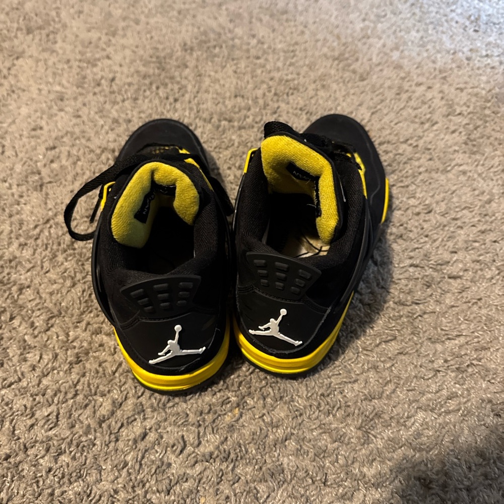 Jordan Black and Yellow Sneakers Iconic Design